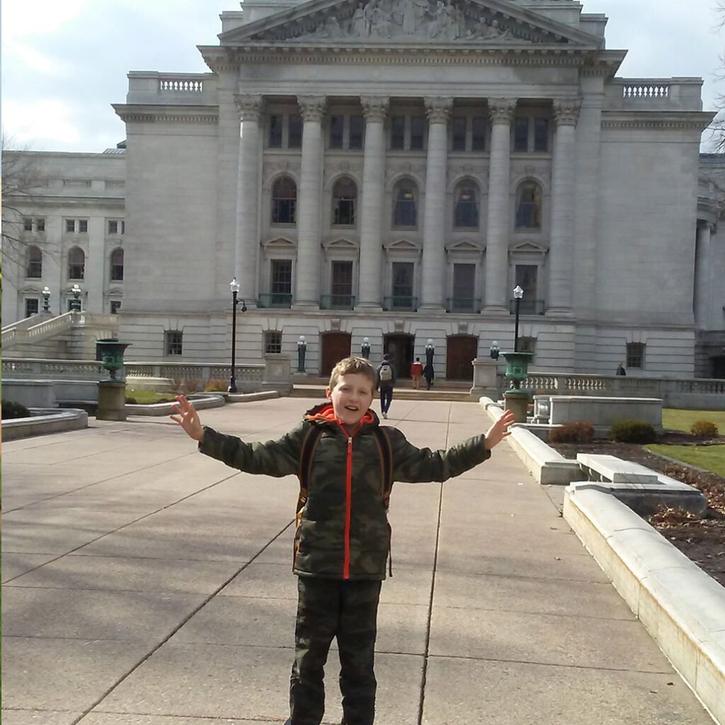 Ty Worden in front of the capitol building in Madison, WI.